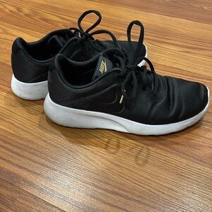 Black satin Nike sneakers